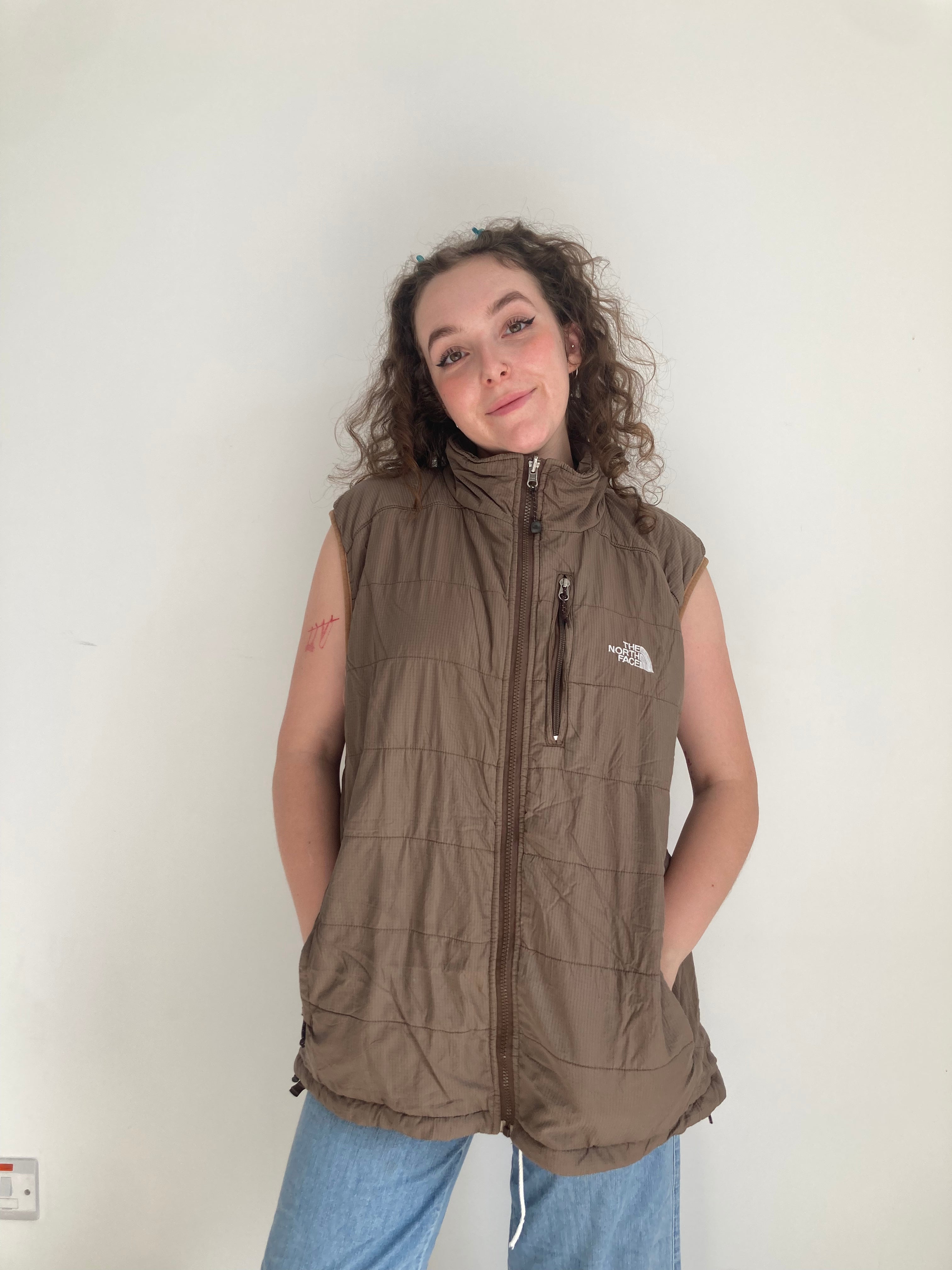 vintage tan brown north face sleeveless puffer jacket